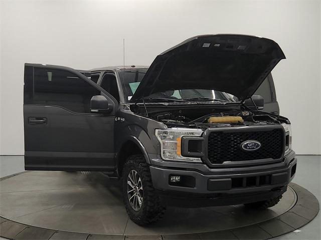 used 2018 Ford F-150 car, priced at $25,453