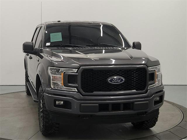 used 2018 Ford F-150 car, priced at $25,453