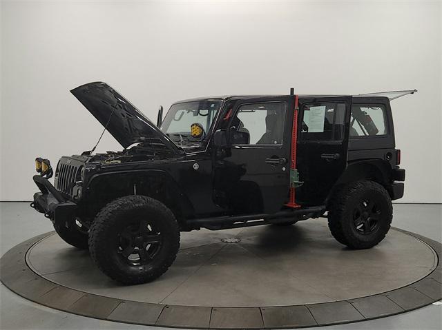 used 2016 Jeep Wrangler Unlimited car, priced at $16,693