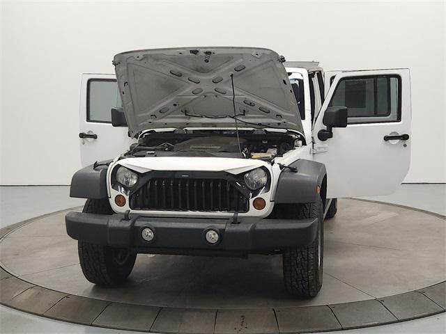 used 2013 Jeep Wrangler Unlimited car, priced at $17,989