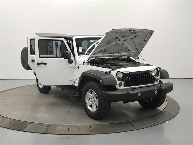 used 2013 Jeep Wrangler Unlimited car, priced at $17,989