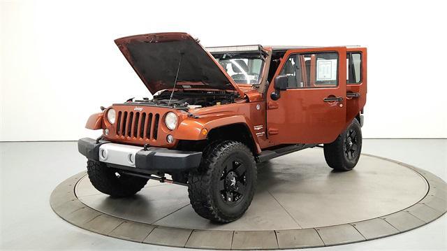 used 2014 Jeep Wrangler Unlimited car, priced at $19,952