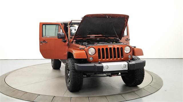 used 2014 Jeep Wrangler Unlimited car, priced at $19,952