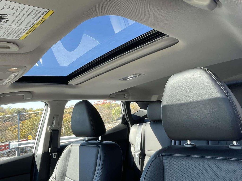 used 2021 Nissan Rogue Sport car, priced at $23,054