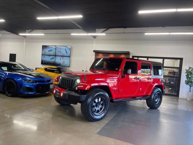 used 2016 Jeep Wrangler Unlimited car, priced at $23,977