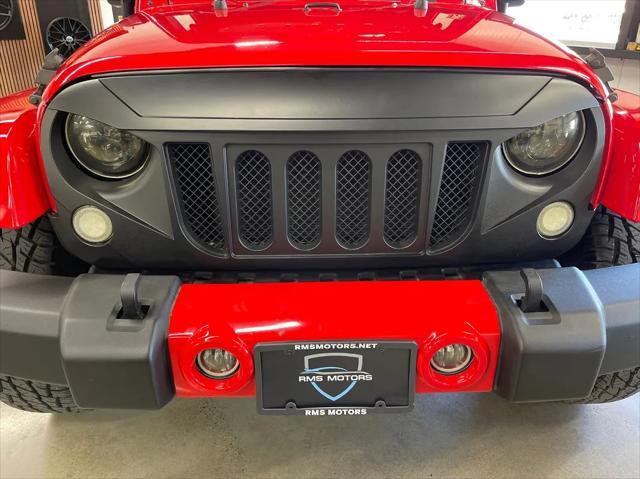 used 2016 Jeep Wrangler Unlimited car, priced at $23,977