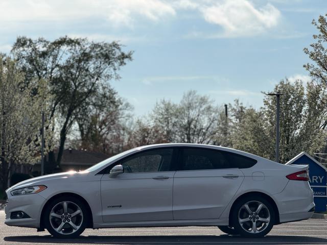 used 2013 Ford Fusion Hybrid car, priced at $4,995