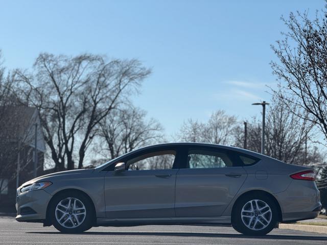 used 2015 Ford Fusion car, priced at $5,500