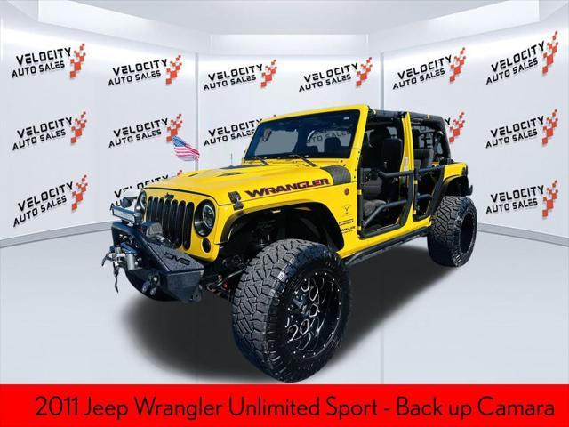 used 2011 Jeep Wrangler Unlimited car, priced at $16,990