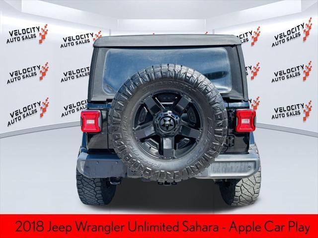 used 2018 Jeep Wrangler Unlimited car, priced at $23,990