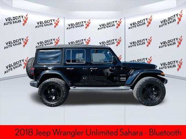 used 2018 Jeep Wrangler Unlimited car, priced at $23,990