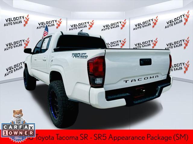 used 2018 Toyota Tacoma car, priced at $27,488