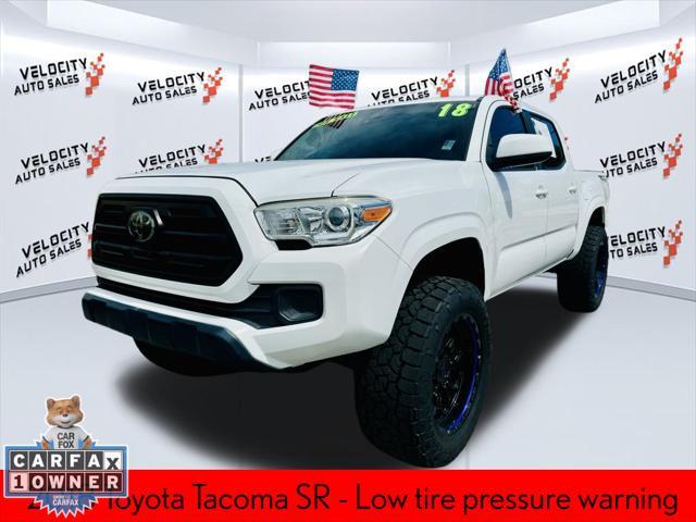 used 2018 Toyota Tacoma car, priced at $27,488