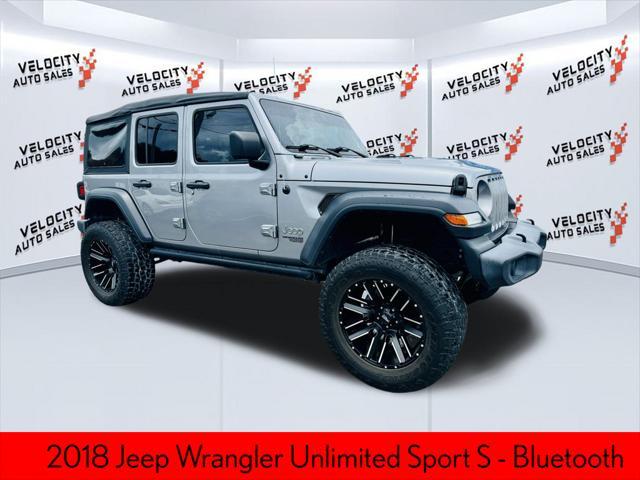 used 2018 Jeep Wrangler Unlimited car, priced at $26,788