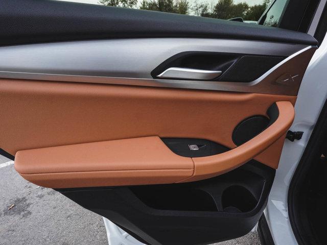 used 2025 BMW X4 car, priced at $48,990