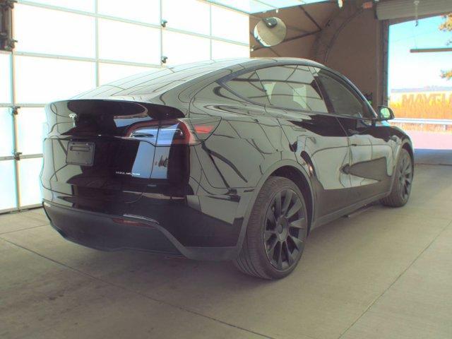 used 2024 Tesla Model Y car, priced at $34,990