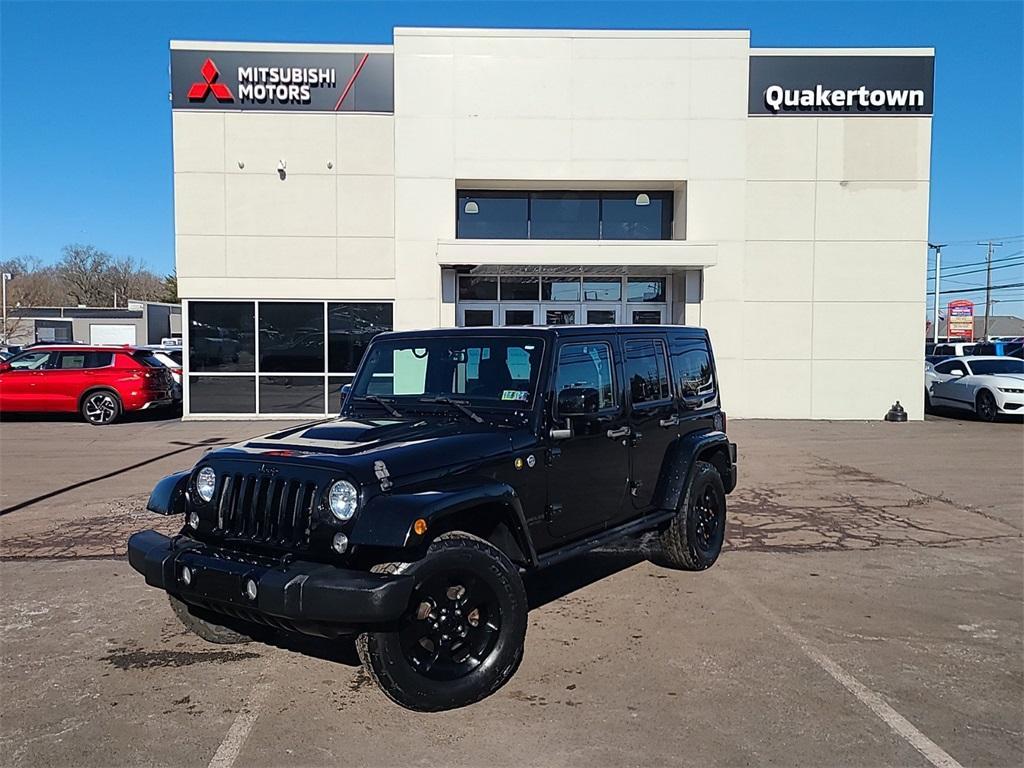 used 2015 Jeep Wrangler Unlimited car, priced at $19,490