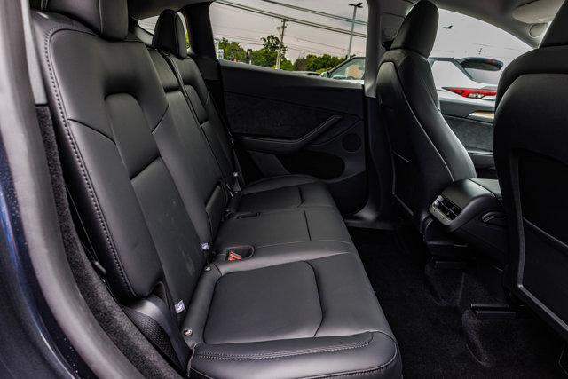 used 2025 Tesla Model Y car, priced at $41,990