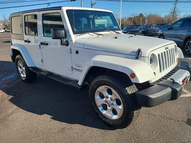 used 2013 Jeep Wrangler Unlimited car, priced at $9,990