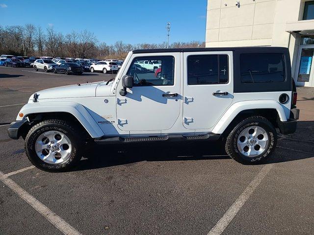 used 2013 Jeep Wrangler Unlimited car, priced at $9,990