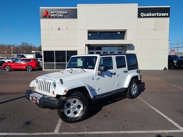 used 2013 Jeep Wrangler Unlimited car, priced at $9,990