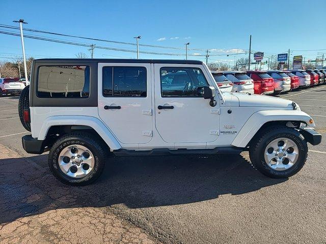 used 2013 Jeep Wrangler Unlimited car, priced at $9,990