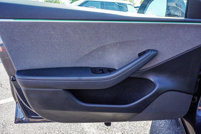 used 2025 Tesla Model 3 car, priced at $32,990