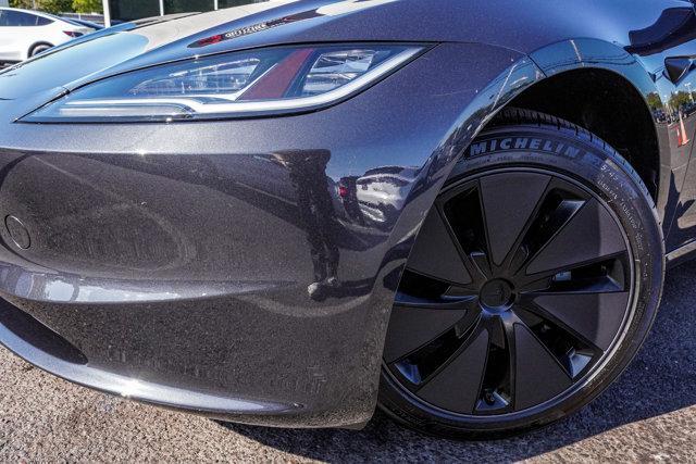 used 2025 Tesla Model 3 car, priced at $32,990