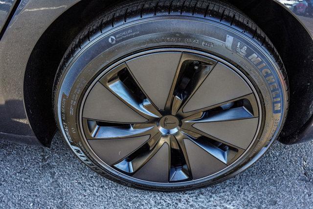 used 2025 Tesla Model 3 car, priced at $32,990