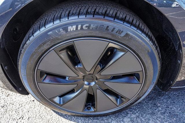 used 2025 Tesla Model 3 car, priced at $32,990