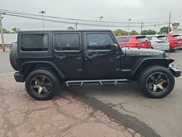 used 2015 Jeep Wrangler Unlimited car, priced at $21,990