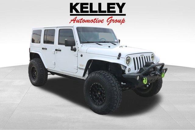 used 2014 Jeep Wrangler Unlimited car, priced at $24,599