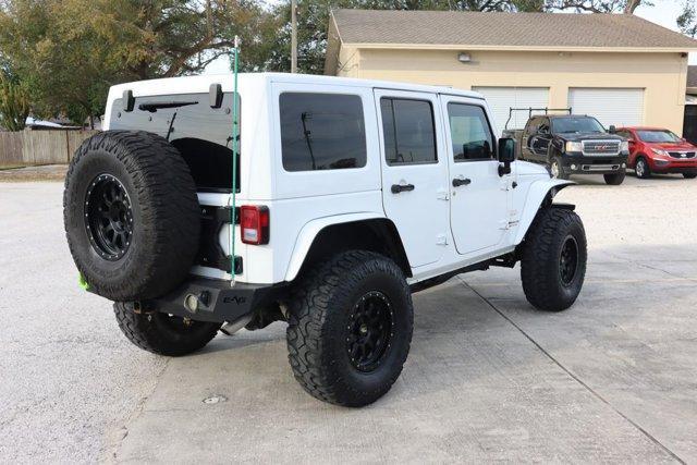 used 2014 Jeep Wrangler Unlimited car, priced at $24,599