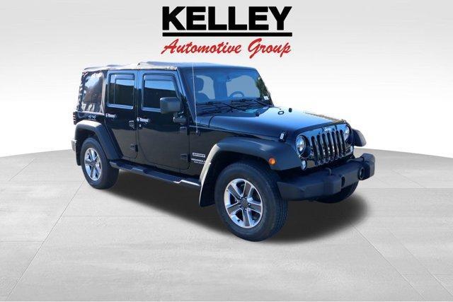 used 2014 Jeep Wrangler Unlimited car, priced at $17,680