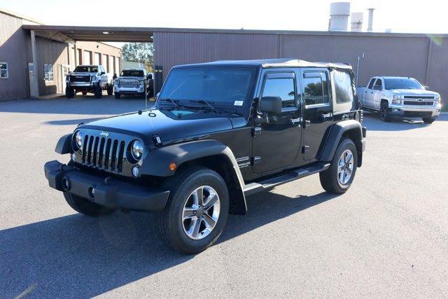 used 2014 Jeep Wrangler Unlimited car, priced at $17,680