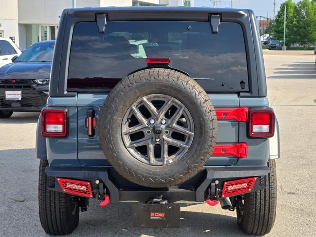 used 2024 Jeep Wrangler car, priced at $38,595