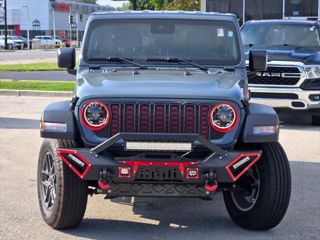 used 2024 Jeep Wrangler car, priced at $38,595