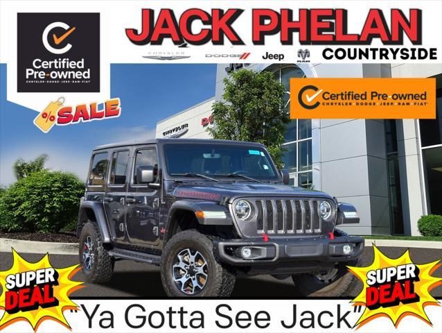 used 2021 Jeep Wrangler Unlimited car, priced at $41,329