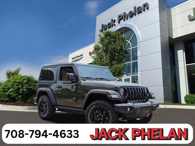 used 2023 Jeep Wrangler car, priced at $34,399