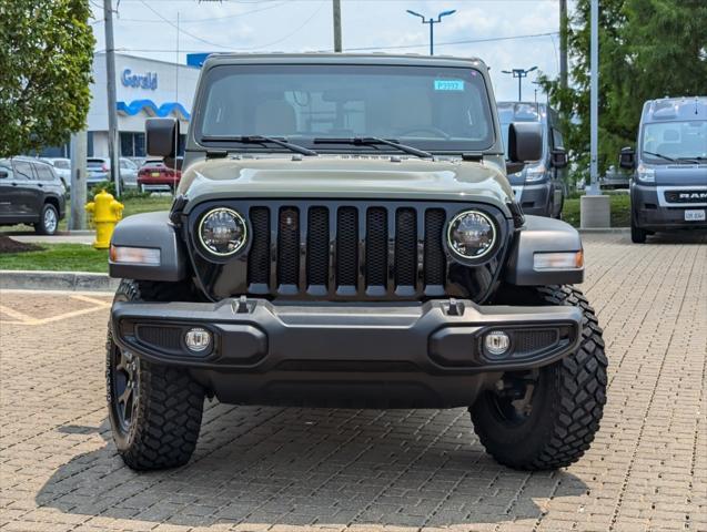 used 2023 Jeep Wrangler car, priced at $34,399