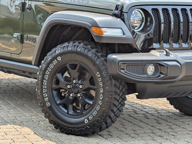 used 2023 Jeep Wrangler car, priced at $34,399