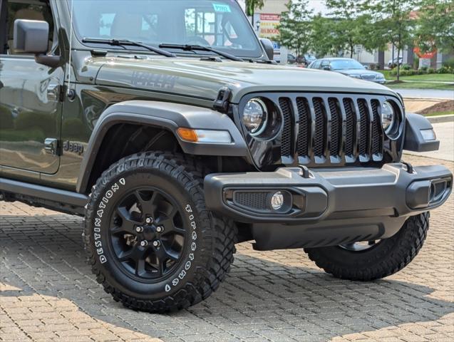 used 2023 Jeep Wrangler car, priced at $34,399