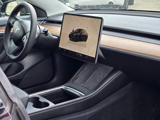 used 2023 Tesla Model 3 car, priced at $34,040