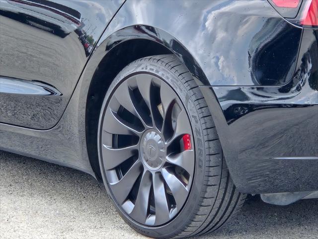 used 2023 Tesla Model 3 car, priced at $34,040