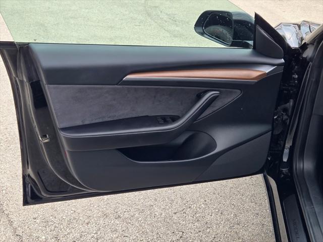 used 2023 Tesla Model 3 car, priced at $34,040