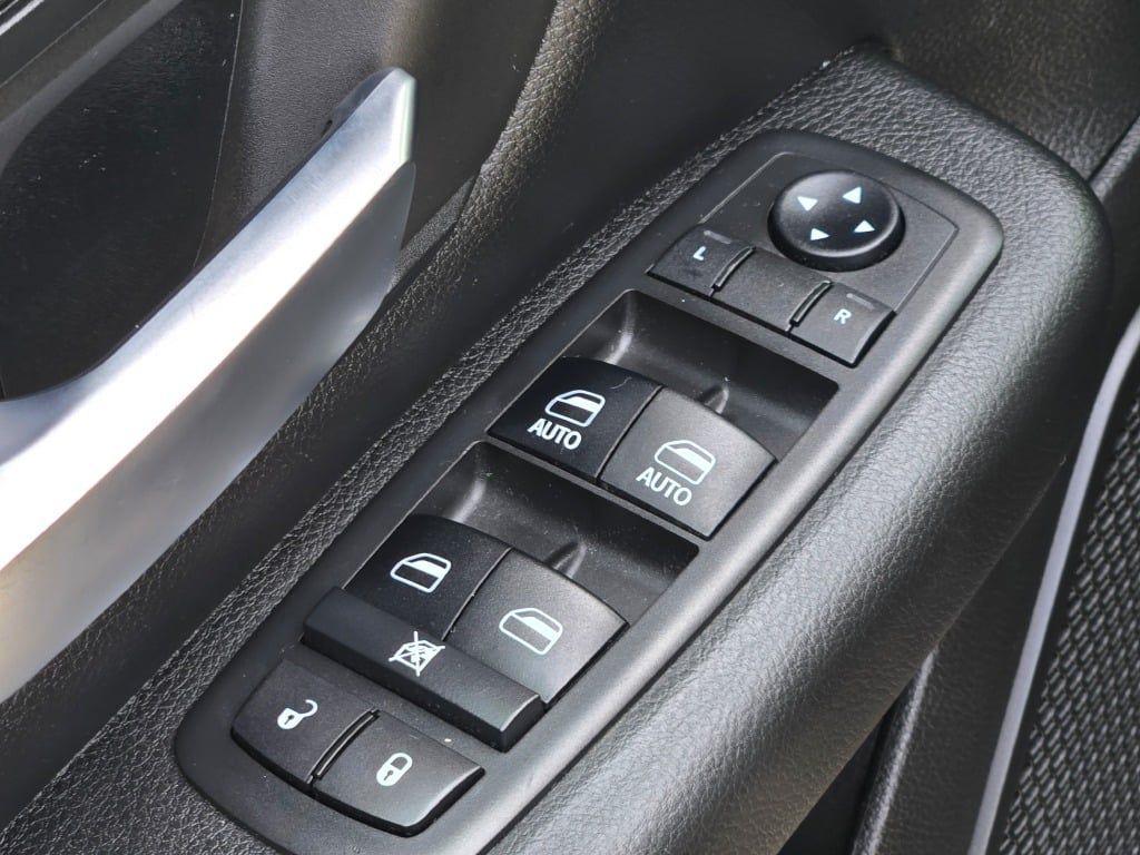 used 2019 Ram 1500 car, priced at $27,233