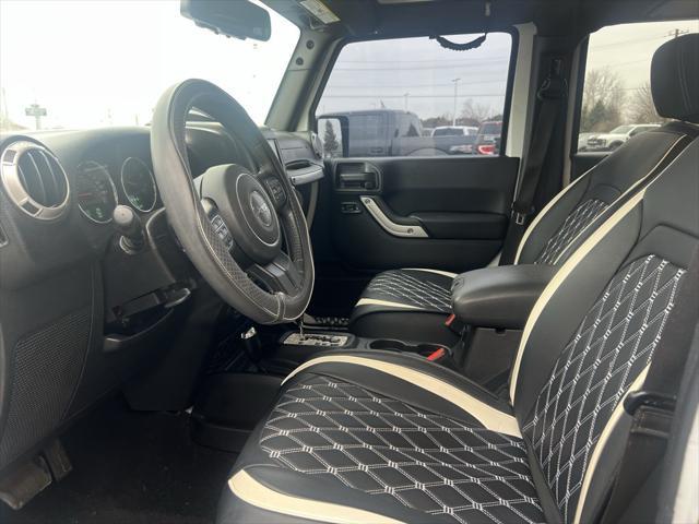 used 2016 Jeep Wrangler Unlimited car, priced at $19,940