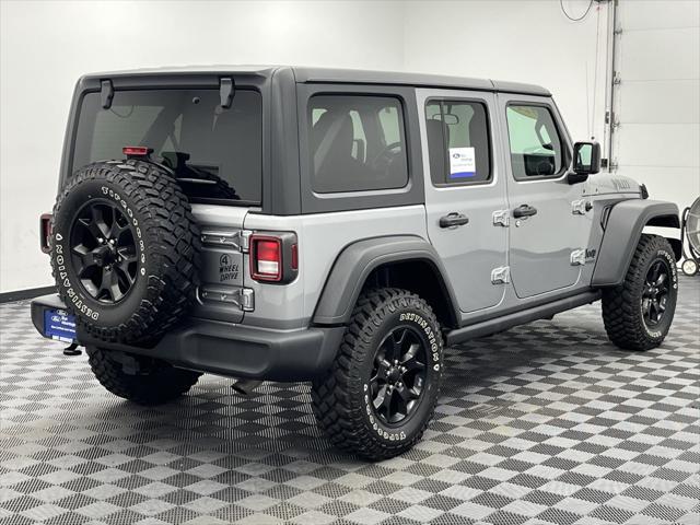 used 2021 Jeep Wrangler Unlimited car, priced at $31,427