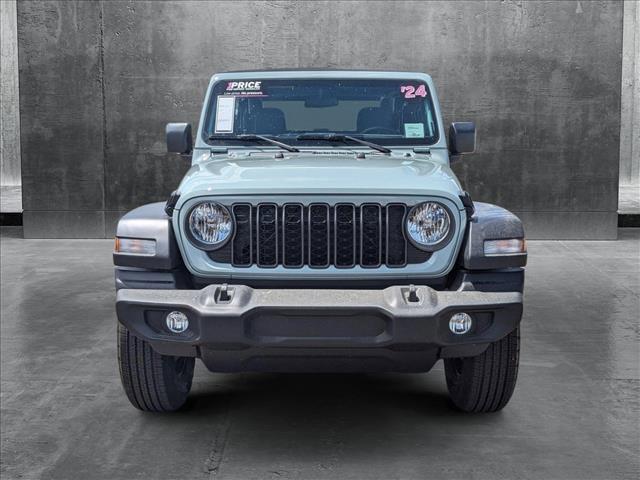 used 2024 Jeep Wrangler car, priced at $30,301