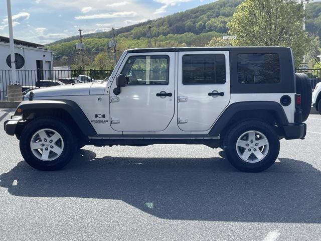 used 2009 Jeep Wrangler Unlimited car, priced at $12,900